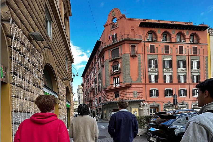 Students walking in Italy.